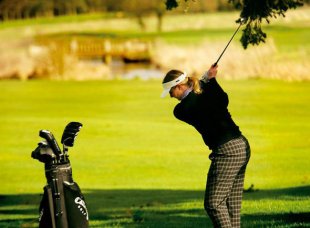 A woman the game of golf at Matfen Hall